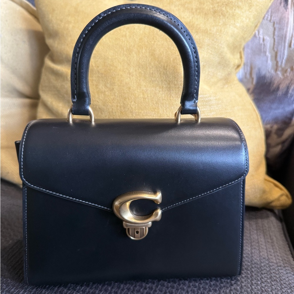 Coach Black Leather Handbag with Gold Accents